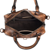 Leather crossbody bag clasp closure close-up