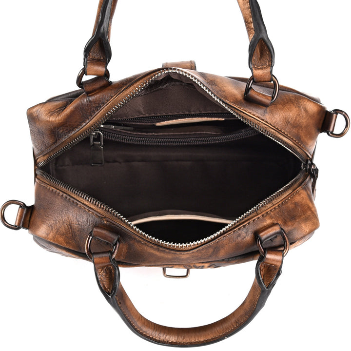 Leather crossbody bag clasp closure close-up