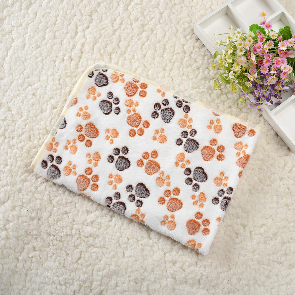 Cream paw print fleece pet blanket with brown paws