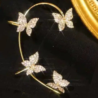 Gold-tone butterfly ear cuff close-up
