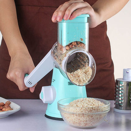 Mandoline slicer slicing potato rounds