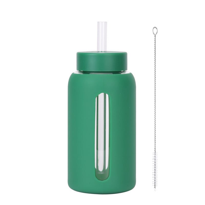 Insulated borosilicate glass cup with straw lid and silicone sleeve