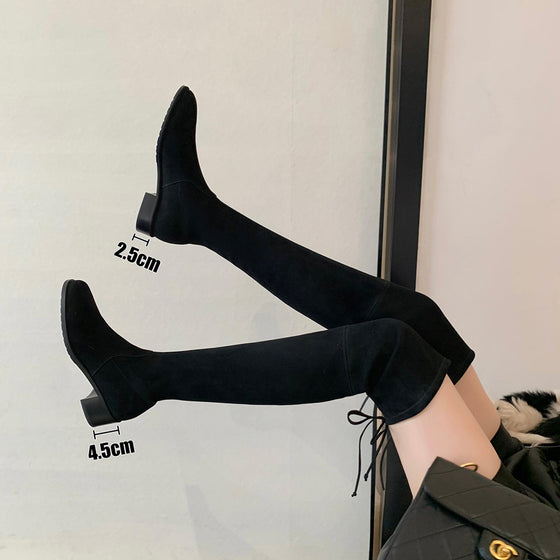 Black boots with heel heights marked 2.5 cm and 4.5 cm