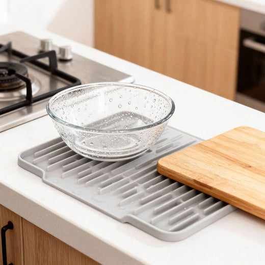 Silicone mat used as a trivet under a hot pan