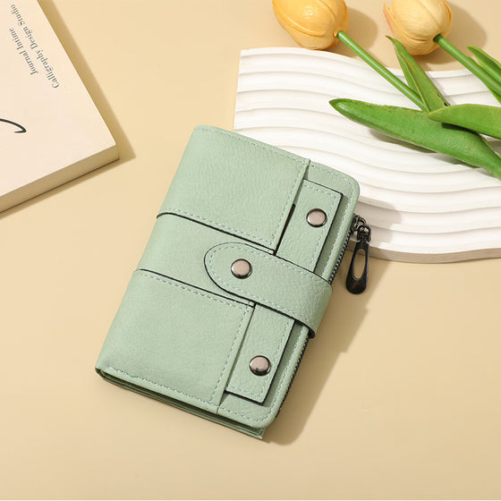 Mint green slim bifold wallet with a zip coin pocket