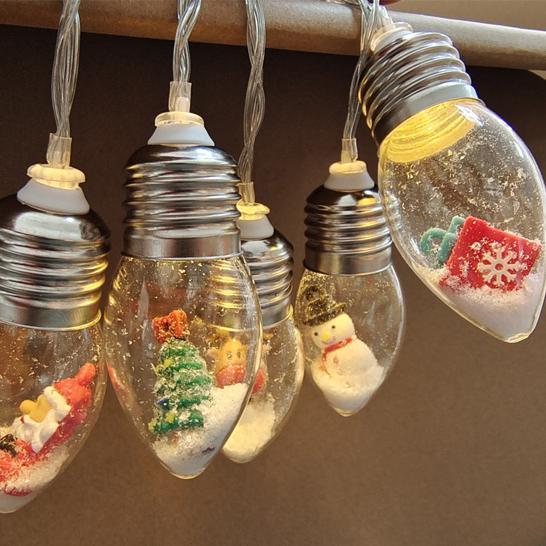 Christmas character LED string lights with snowman, Santa, tree and reindeer figures in clear bulbs