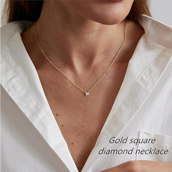 Woman in a white shirt wearing the gold square cubic zirconia solitaire necklace