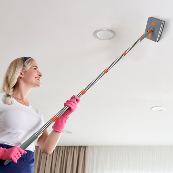 Woman cleaning a ceiling with the extendable wall mop