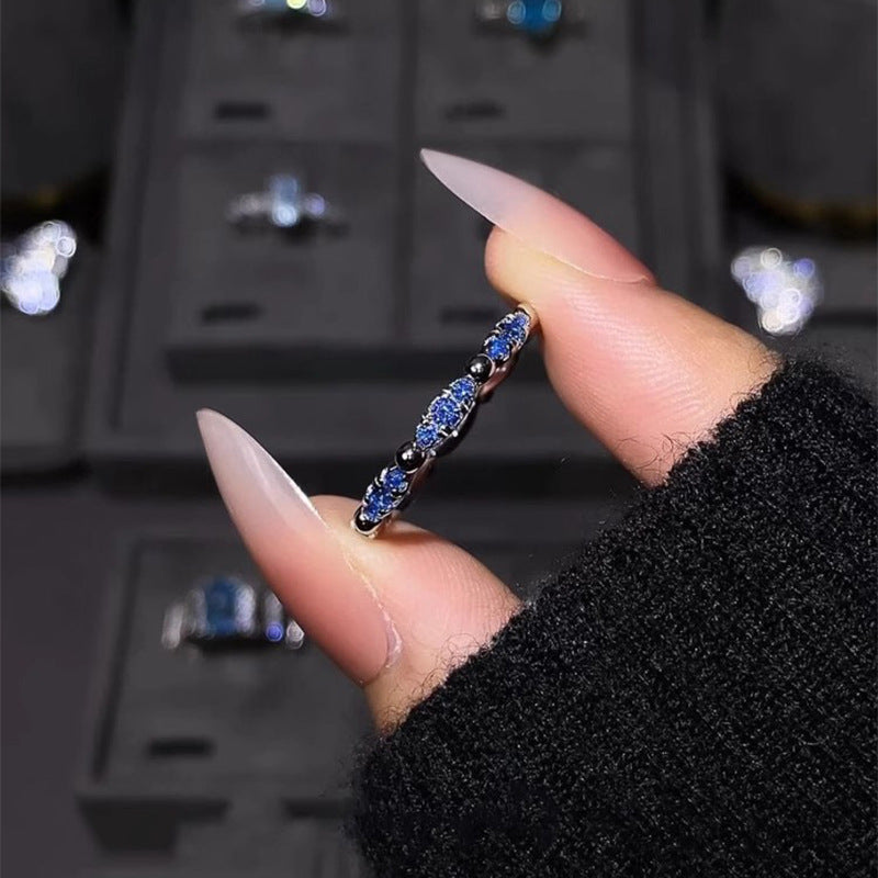 Shining blue small prong-set diamond ring