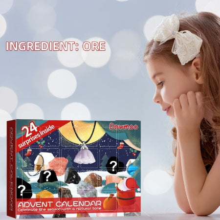 Girl looking at the 24-door mineral advent calendar with crystal pendants