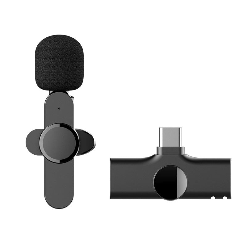 Close-up of the metal clip mechanism that secures the mic to fabric