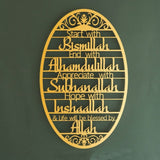 Modern sculpted metal wall art mounted in a living room
