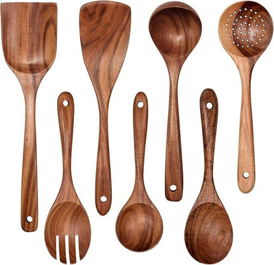 Wooden cooking utensils laid out for non stick pans