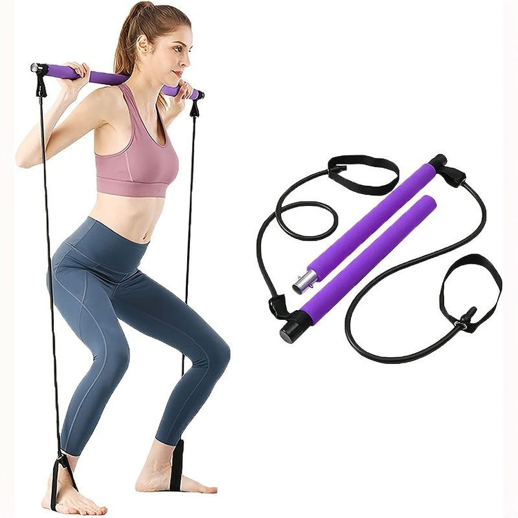 Resistance band attachment detail on Pilates bar