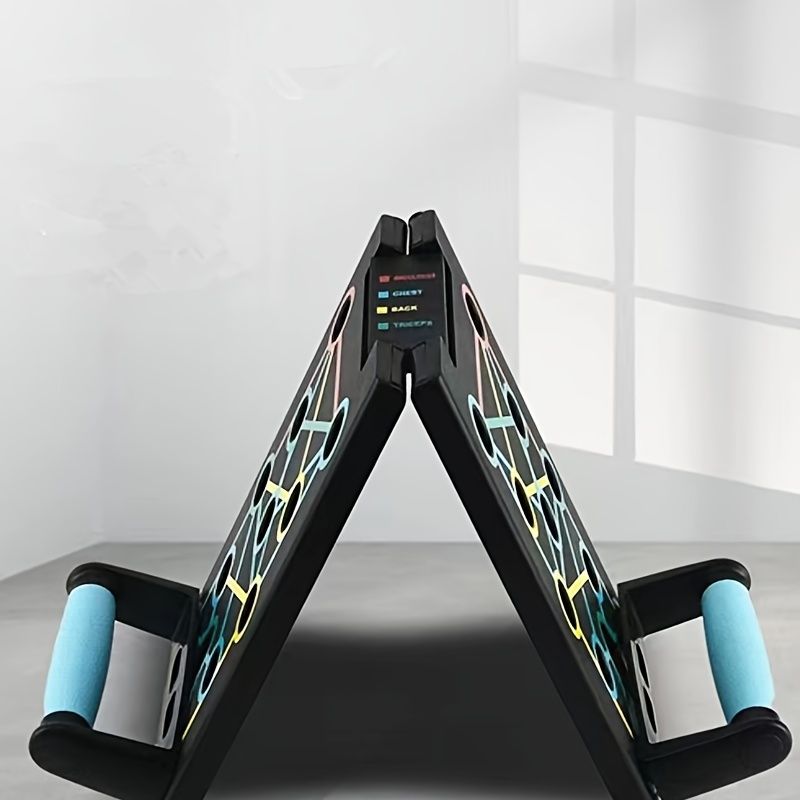 Multi-functional push up board with color-coded muscle slots