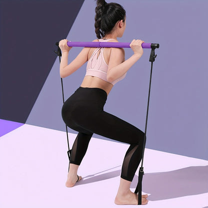 Pilates bar with resistance bands in purple