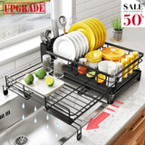 Stainless steel dish rack expanded next to sink