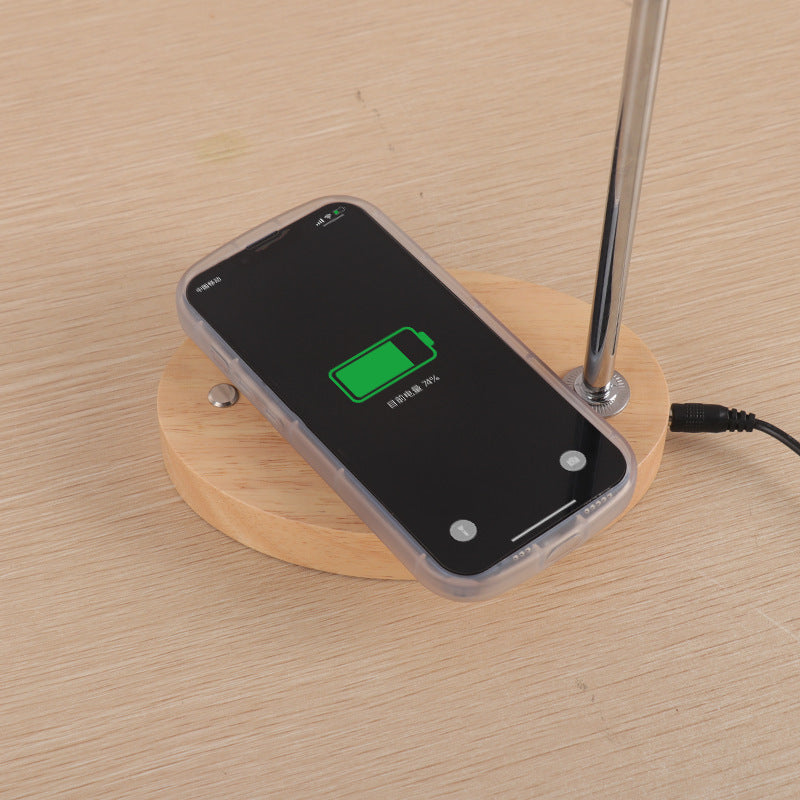 Magnetic levitating LED light bulb floating above a black base, photo 4