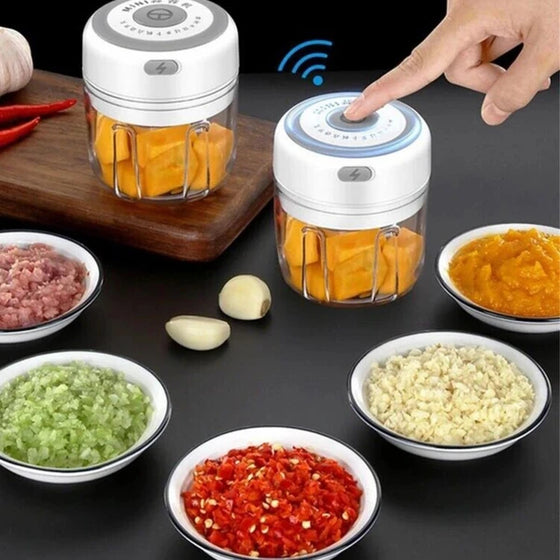 White mini choppers with bowls of chopped vegetables