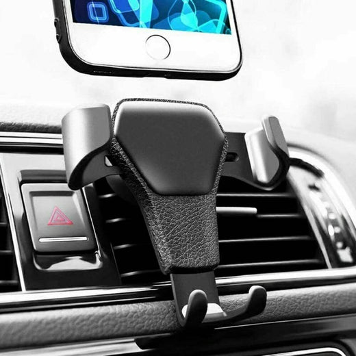 Gravity car phone holder mounted to air vent, front view