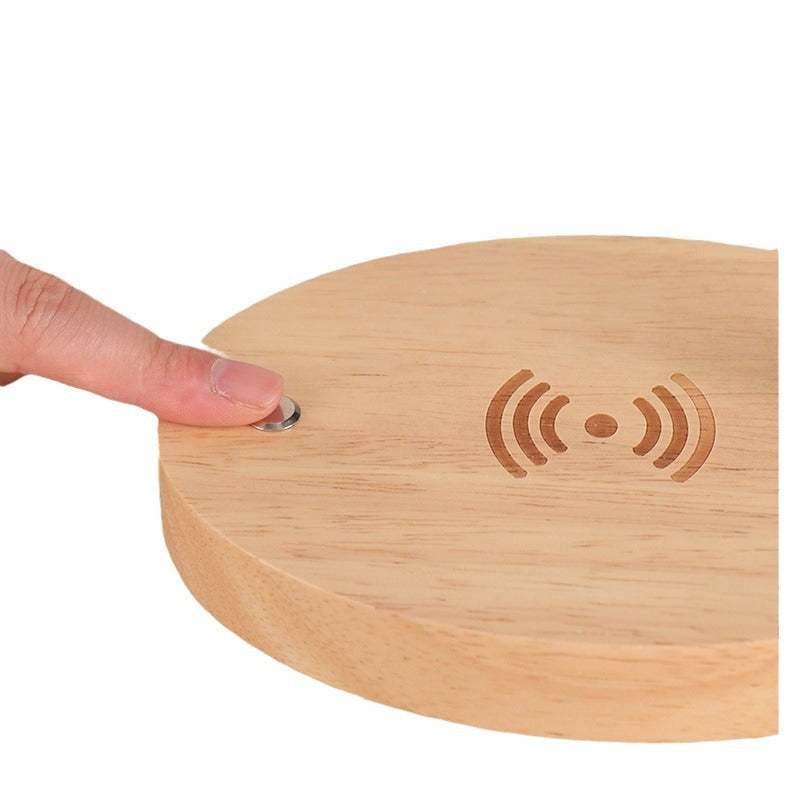 Magnetic levitating LED light bulb floating above a black base, photo 5