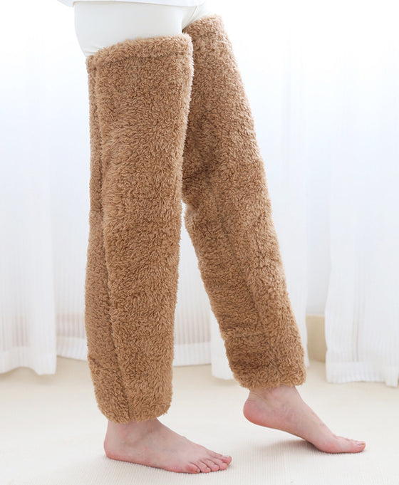 Brown over-the-knee fuzzy socks worn standing, front view