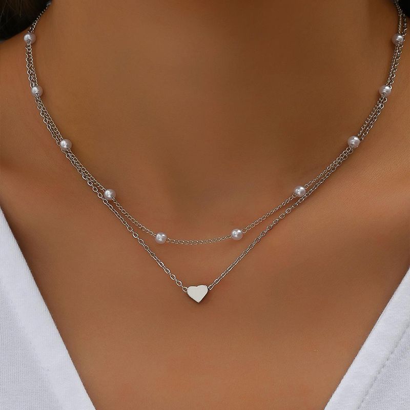 Layered clavicle necklaces