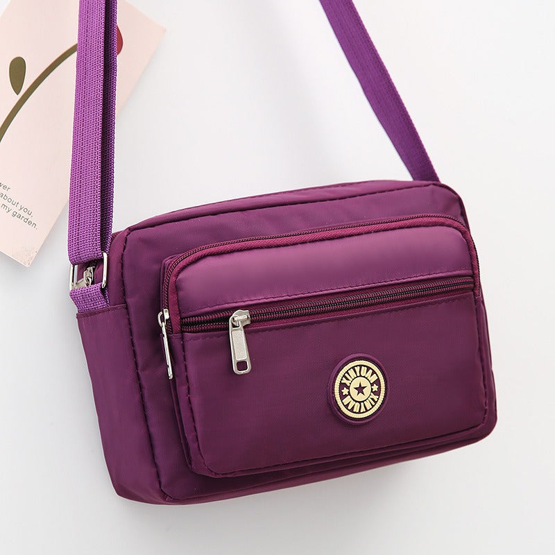 Small printed nylon crossbody bag with zipper, photo 7