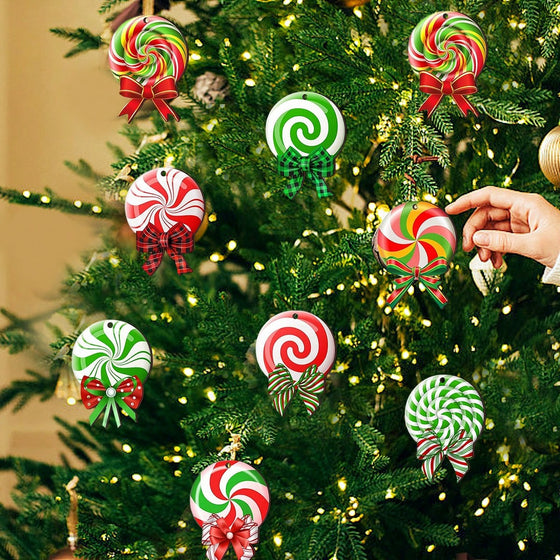 Close-up of red and green peppermint candy ornaments on a Christmas tree