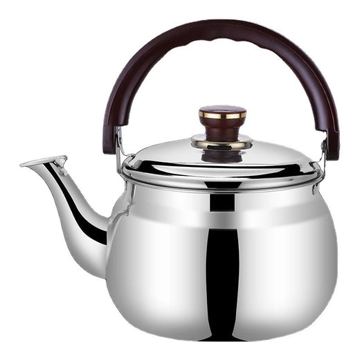 Stainless steel water pitcher on dining table