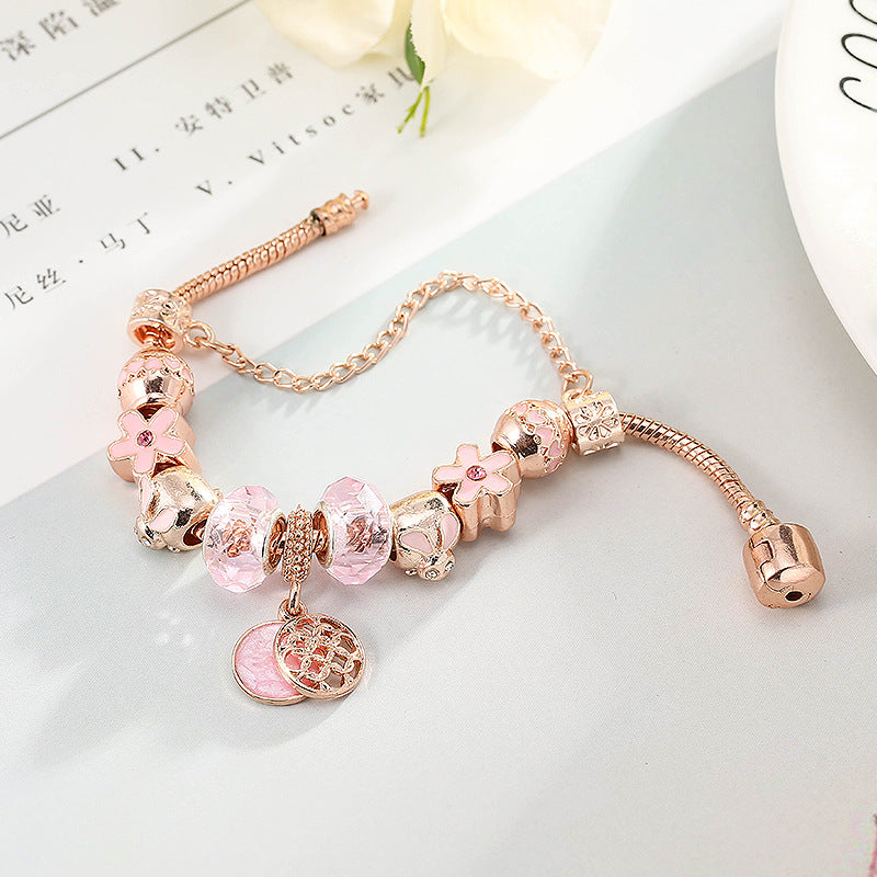 Charm bracelet with a round pendant, style for reference