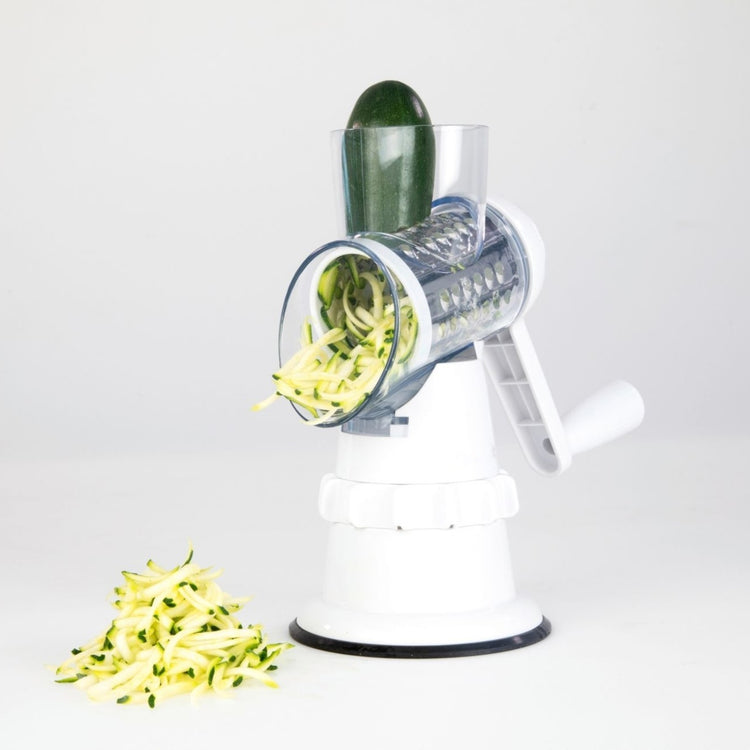 3-in-1 Vegetable Slicer, finger guard in use