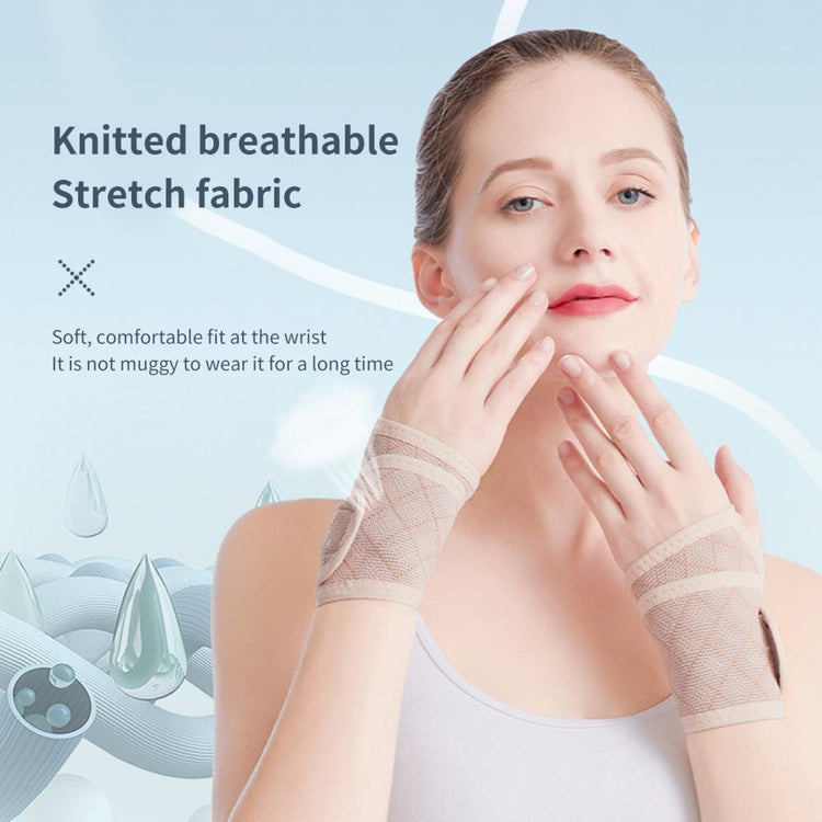 Wrist brace in gray shown flat with adjustable closure