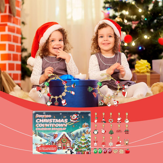Two girls in Santa hats wearing charm bracelets with the advent calendar box