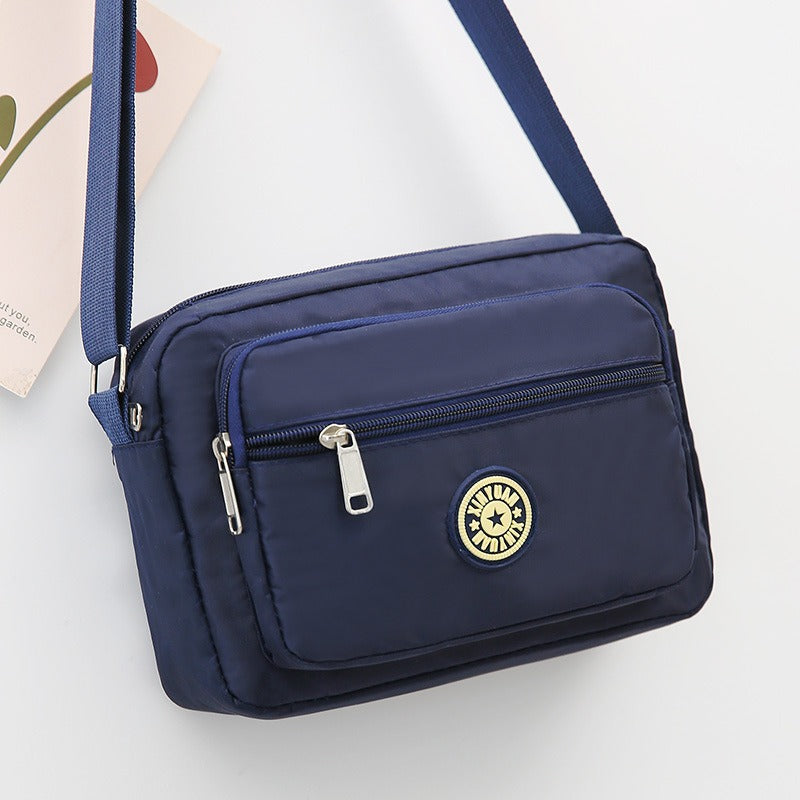 Small printed nylon crossbody bag with zipper, photo 8