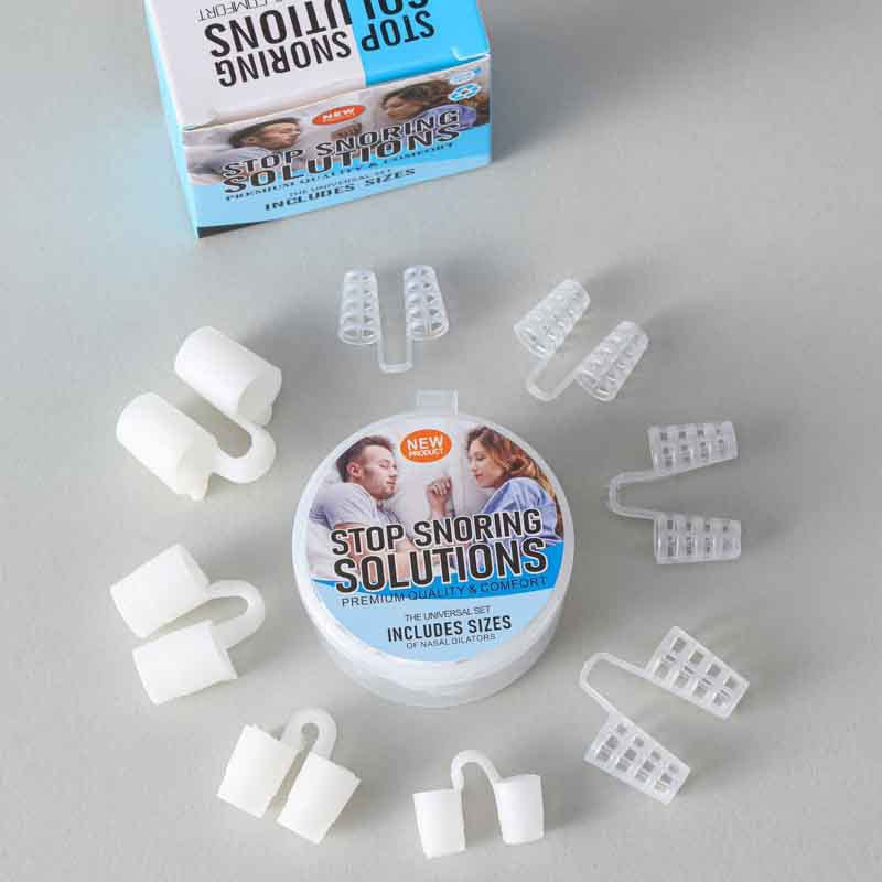 Round case surrounded by white silicone nose clips in different sizes