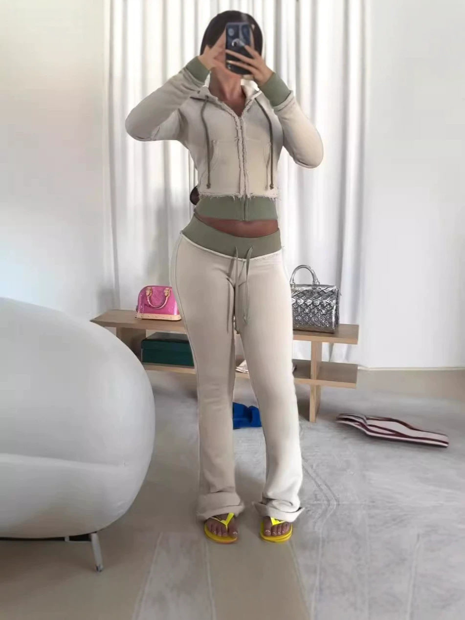 Women's cropped zip-up hoodie and flared pants matching set, photo 1