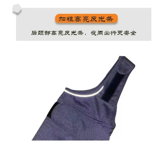 Navy-gray dog vest laid flat showing the reflective strip at the neck