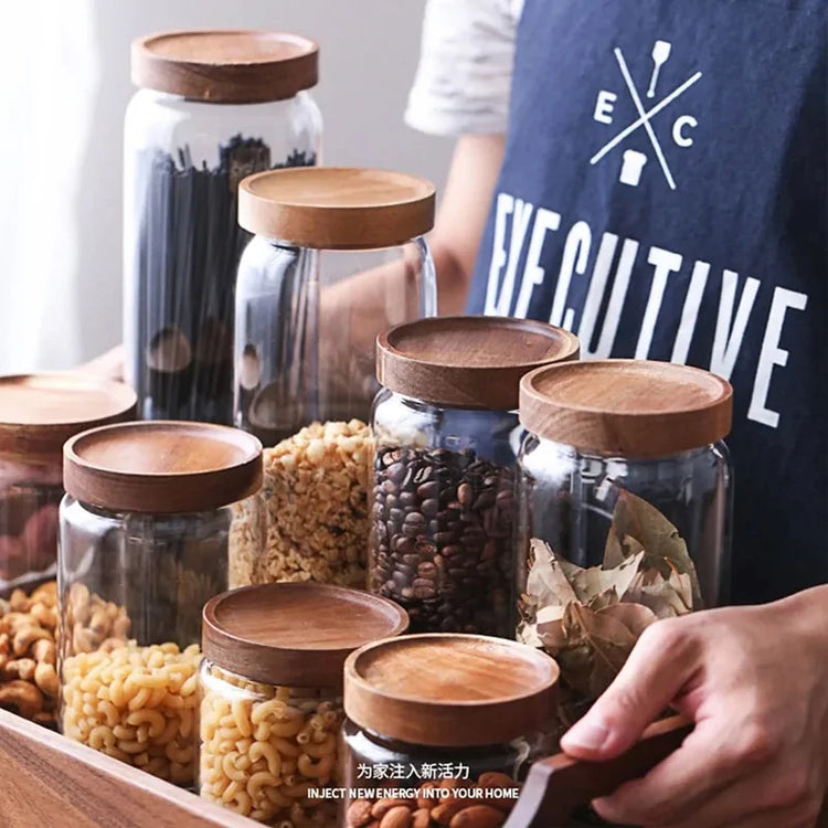 Glass jar shown filled with dry pantry goods like pasta or rice