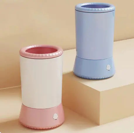 Pet foot washing cup with a dog's paw being dipped inside