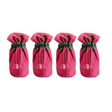 Dog boots shown in the pink colorway