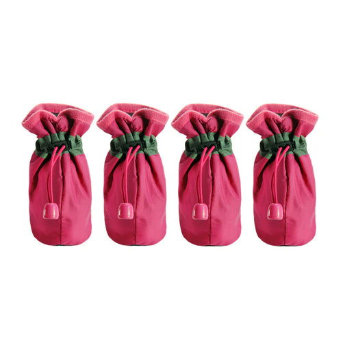 Dog boots shown in the pink colorway