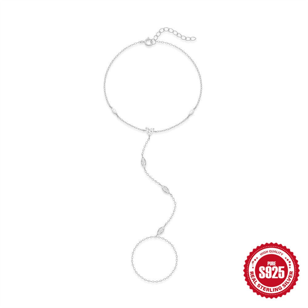 Platinum tone S925 hand chain bracelet with white marquise stones and ring loop