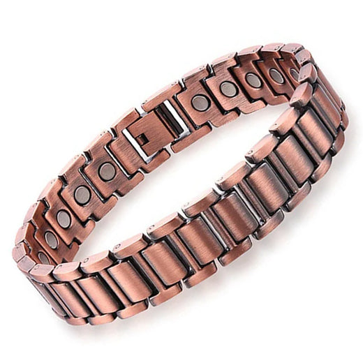 Copper metal bracelet with magnetic properties on a white background