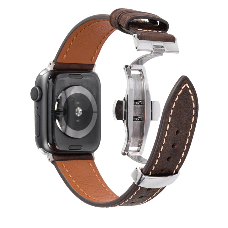 Smartwatch with a brown leather strap on a white background