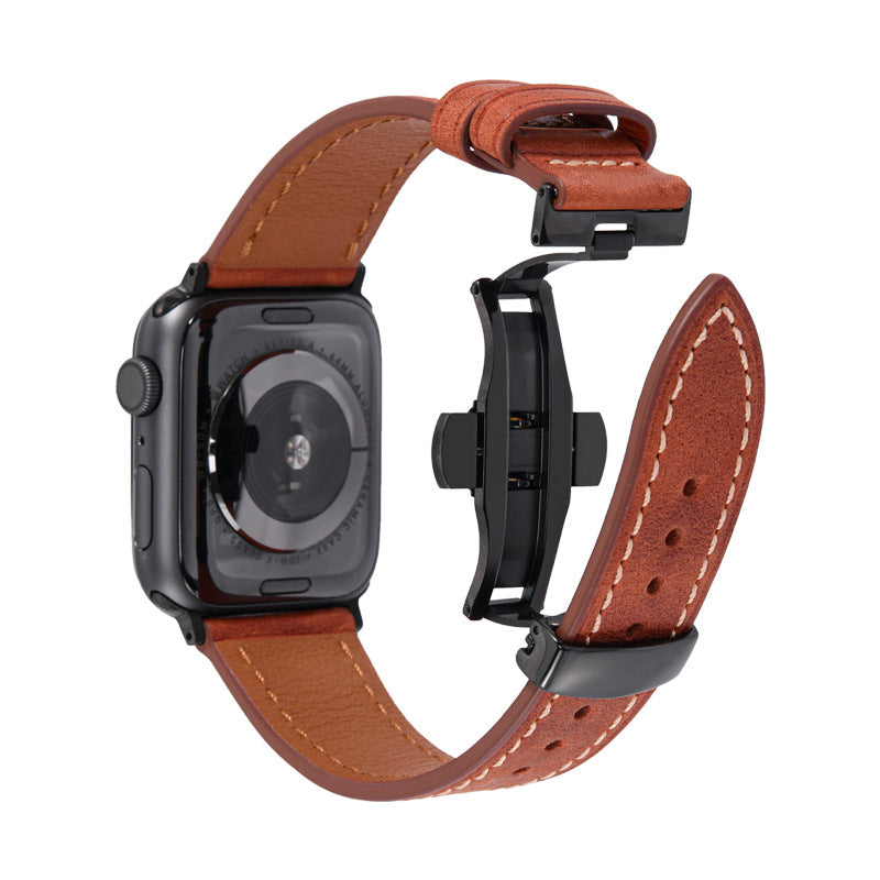 Smartwatch with a brown leather strap on a white background