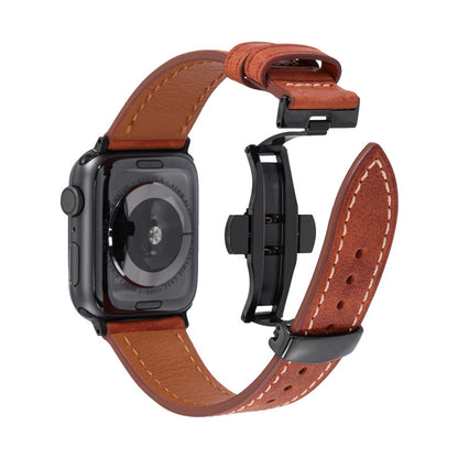 Smartwatch with a brown leather strap on a white background