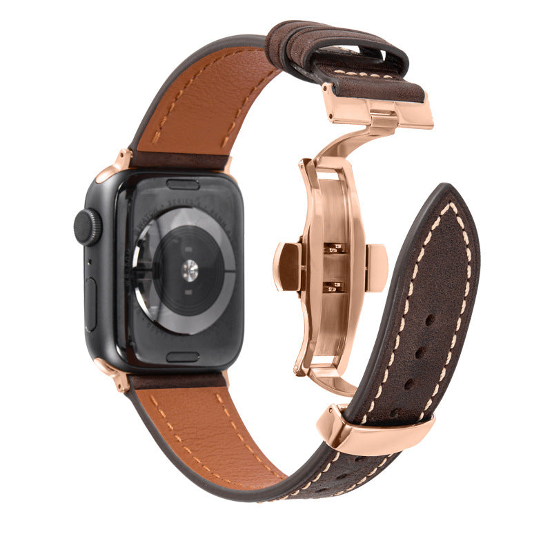 Smartwatch with a brown and black leather strap on a white background