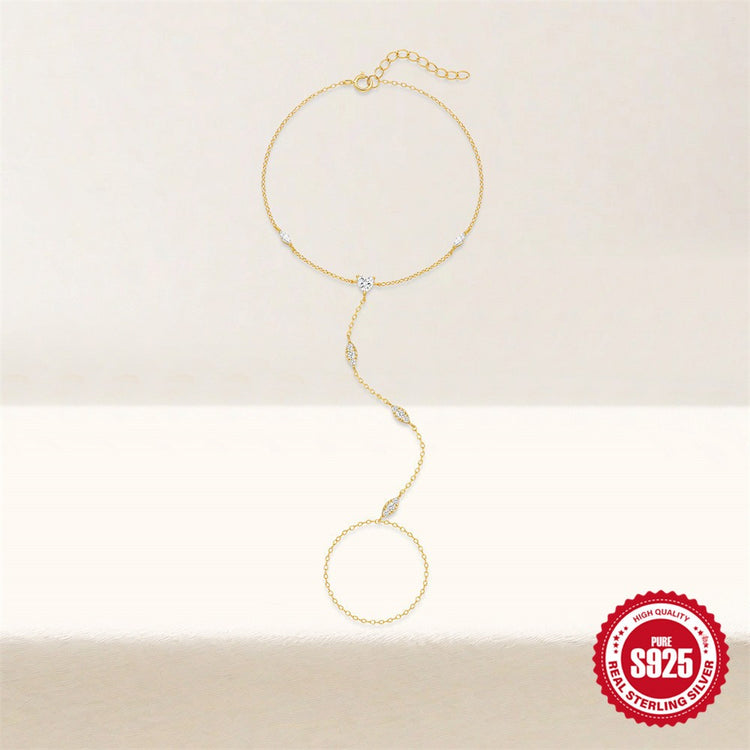 Gold S925 hand chain bracelet with extender chain shown flat on a neutral background