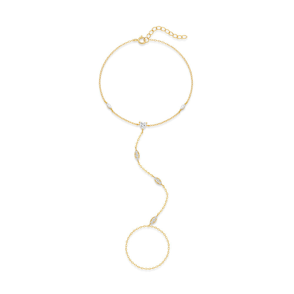 Full view of the gold marquise stone hand chain with bracelet loop and ring loop